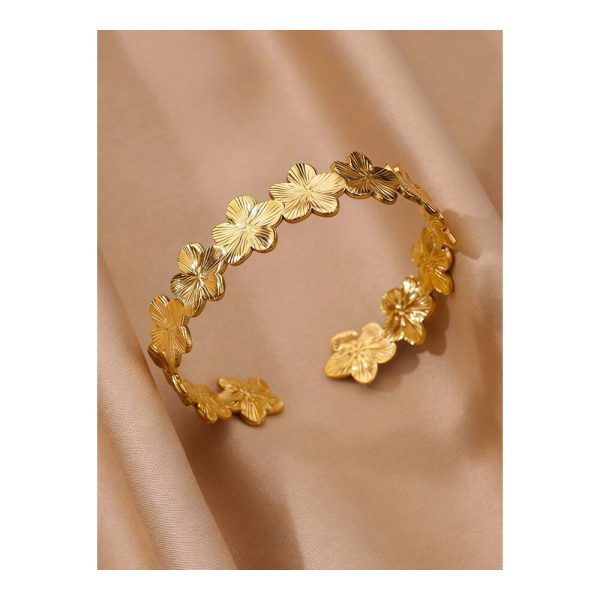 SHEIN - Bracelet manchette fleur plumeria – acier inoxydable plaqué or 18K 1 SHEIN - Bracelet manchette fleur plumeria – acier inoxydable plaqué or 18K 1